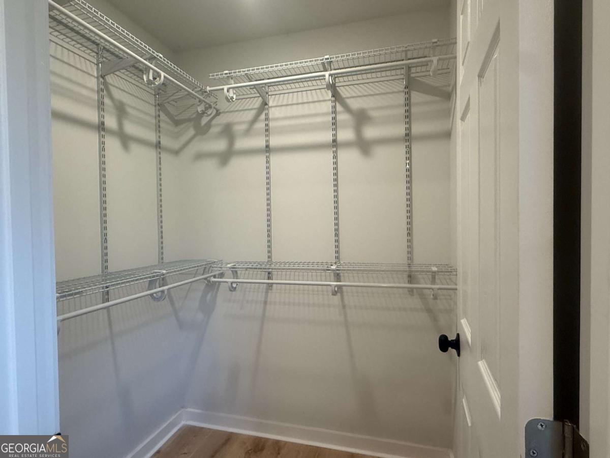 3112 North Avenue Decatur, GA 30033 - Photo 30 of 52 a bathroom with a glass shower door