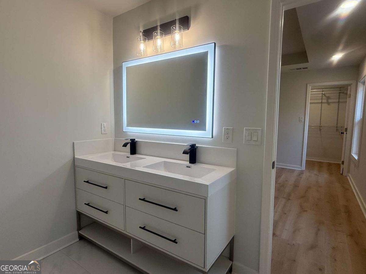 3112 North Avenue Decatur, GA 30033 - Photo 34 of 52 a bathroom with a sink vanity and mirror