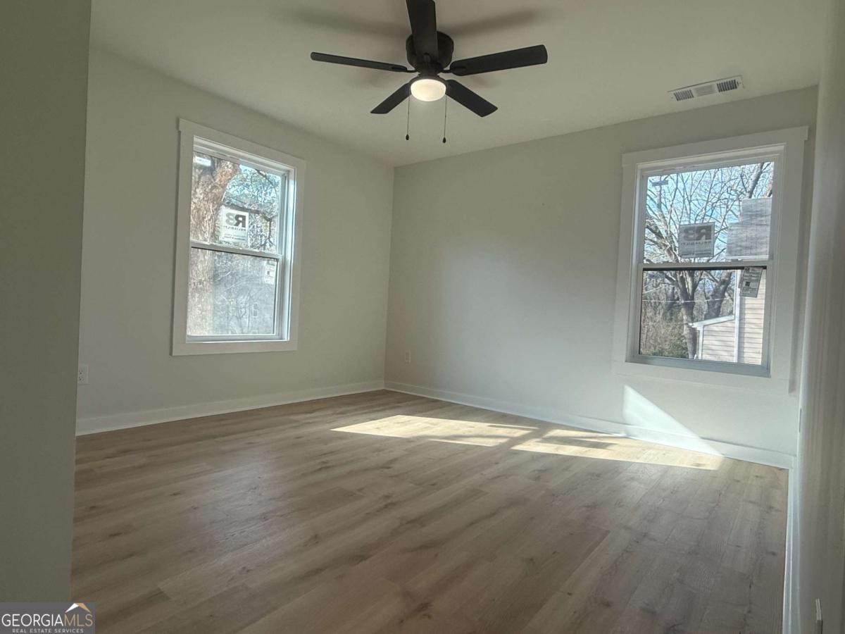 3112 North Avenue Decatur, GA 30033 - Photo 40 of 52 a view of an empty room with a window