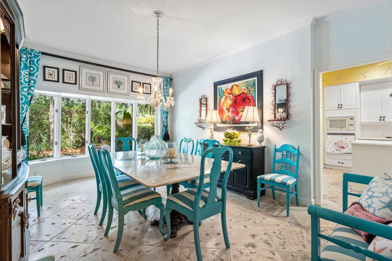 243 Florenada Terrace Boca Raton, FL 33486 - Photo 13 of 48 a view of a dining room with furniture window and outside view