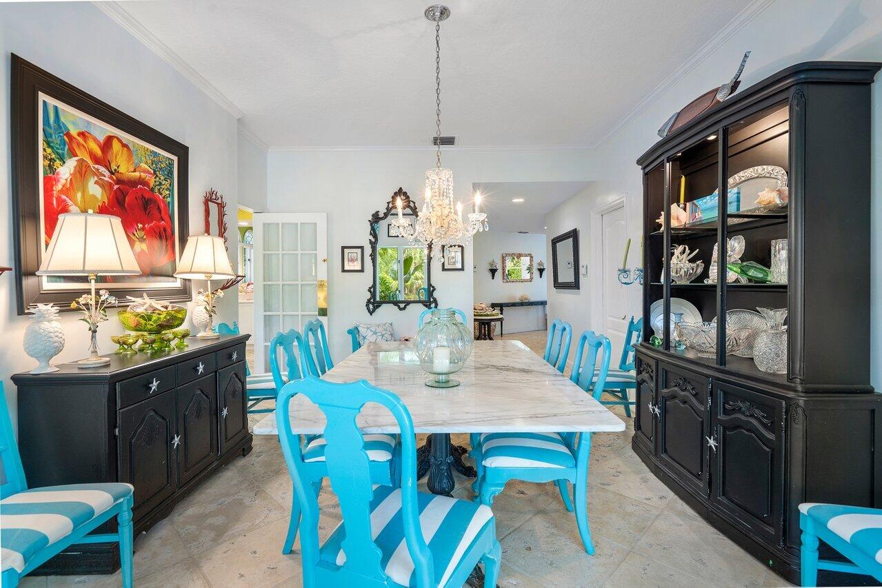 243 Florenada Terrace Boca Raton, FL 33486 - Photo 14 of 48 a view of a dining room with furniture