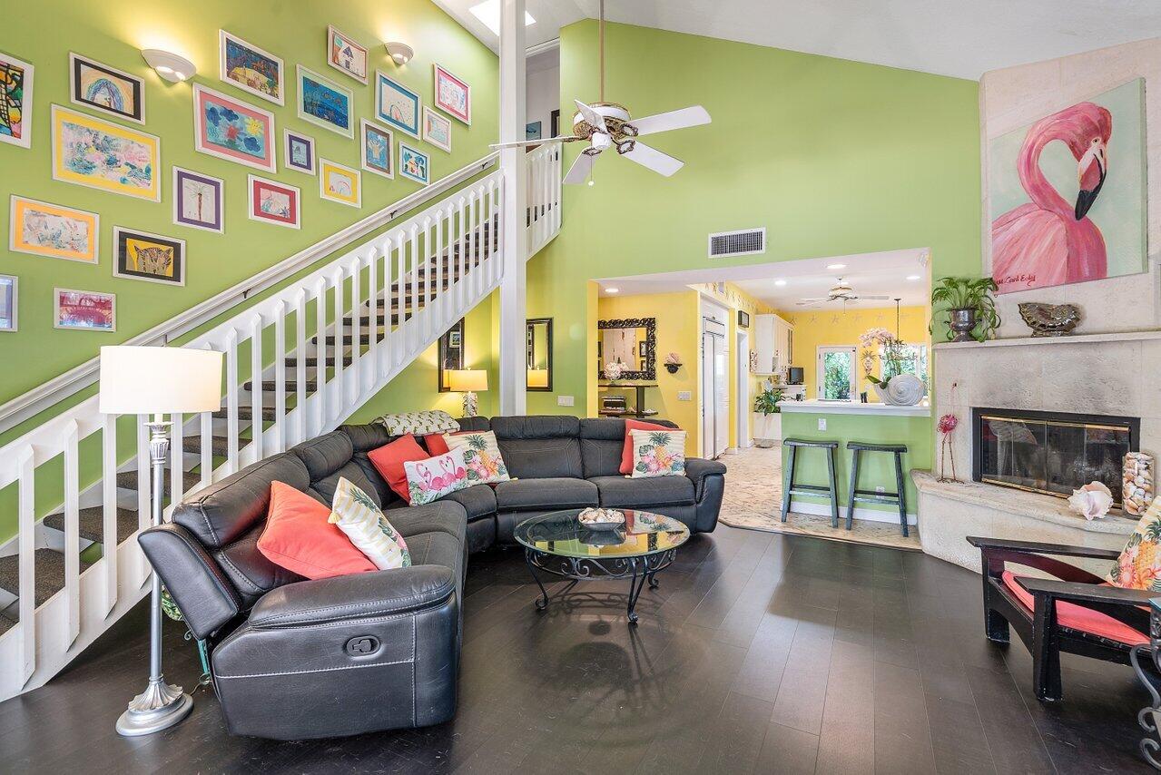 243 Florenada Terrace Boca Raton, FL 33486 - Photo 21 of 48 a living room with furniture and a fireplace