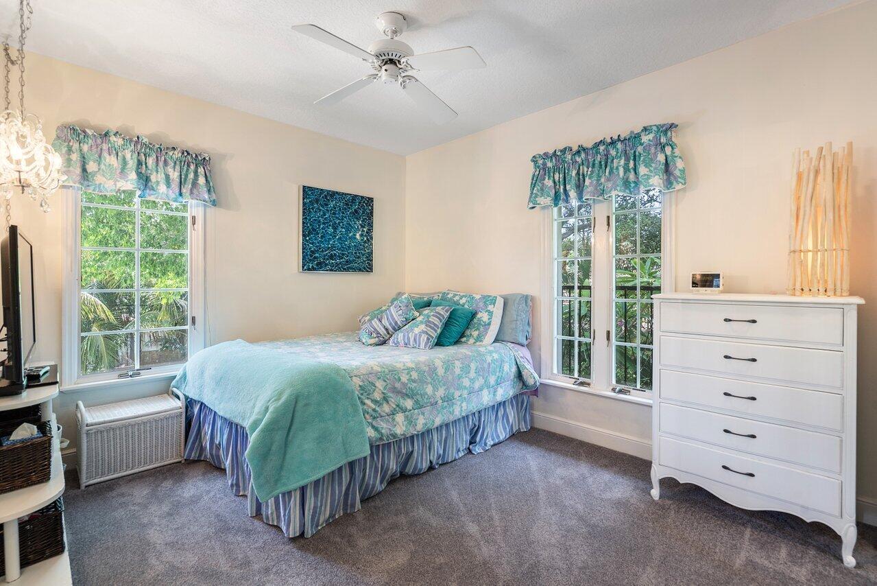 243 Florenada Terrace Boca Raton, FL 33486 - Photo 29 of 48 a bedroom with a bed and a window