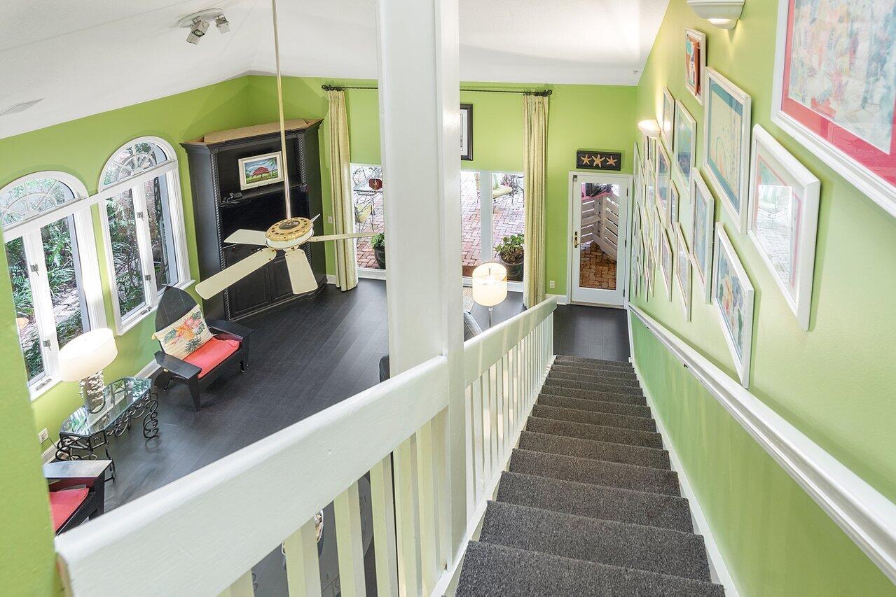 243 Florenada Terrace Boca Raton, FL 33486 - Photo 36 of 48 a view of a hallway with seating space