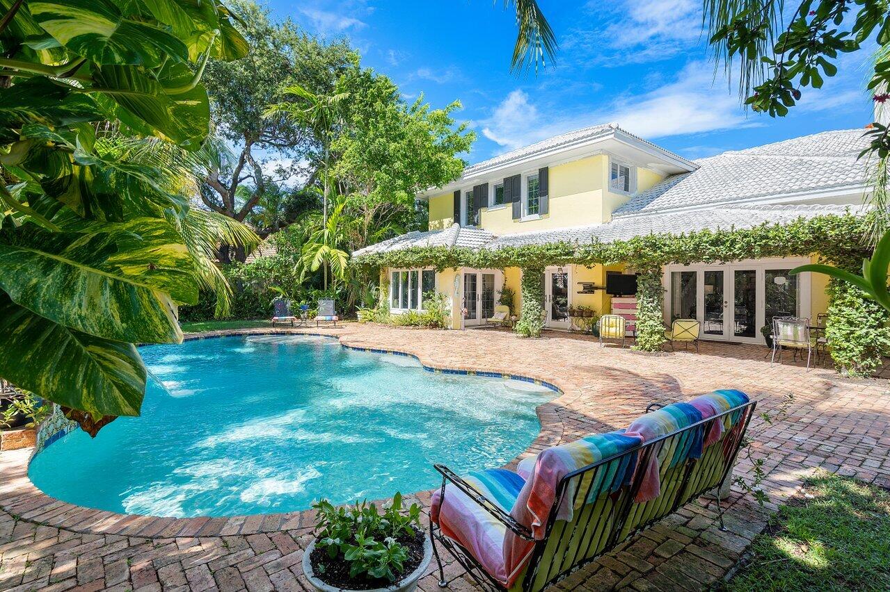 243 Florenada Terrace Boca Raton, FL 33486 - Photo 40 of 48 a view of a house with backyard and sitting area