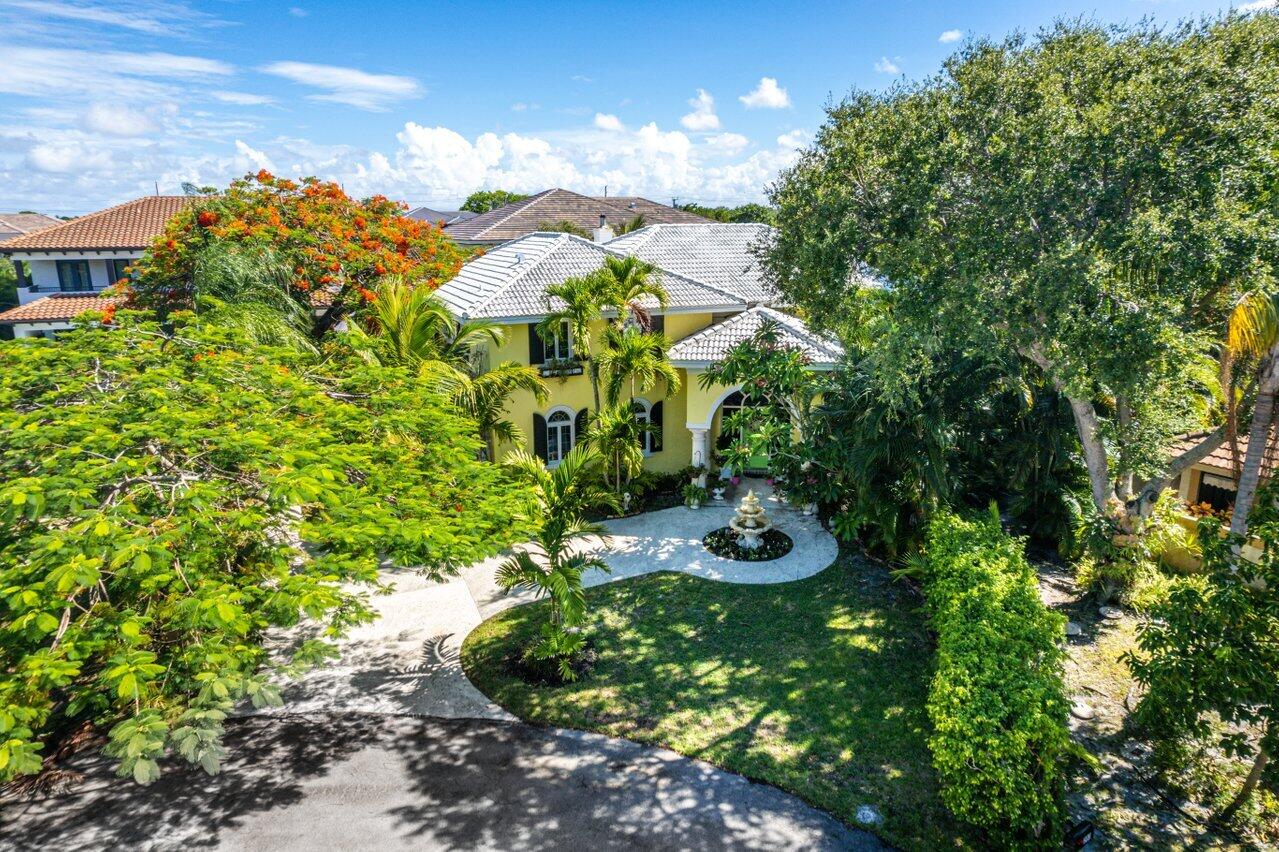 243 Florenada Terrace Boca Raton, FL 33486 - Photo 44 of 48 a view of a garden with plants