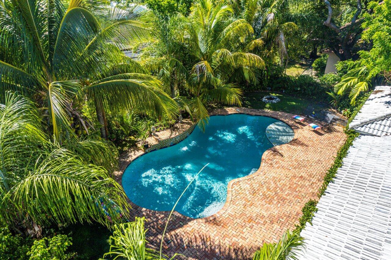 243 Florenada Terrace Boca Raton, FL 33486 - Photo 45 of 48 a view of a garden