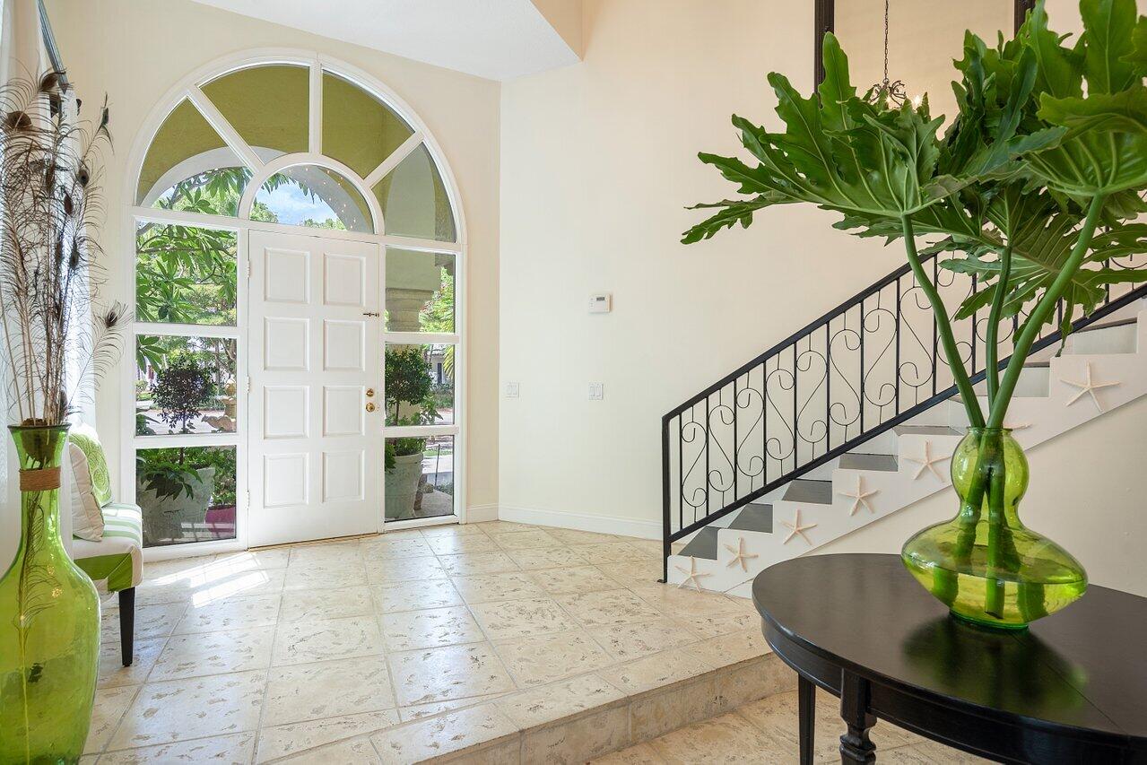 243 Florenada Terrace Boca Raton, FL 33486 - Photo 6 of 48 a view of entryway with a front door