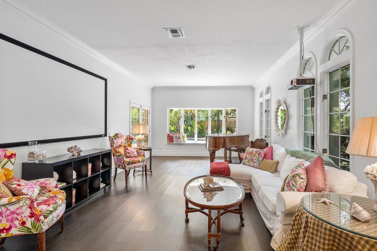 243 Florenada Terrace Boca Raton, FL 33486 - Photo 8 of 48 a living room with furniture and a flat screen tv