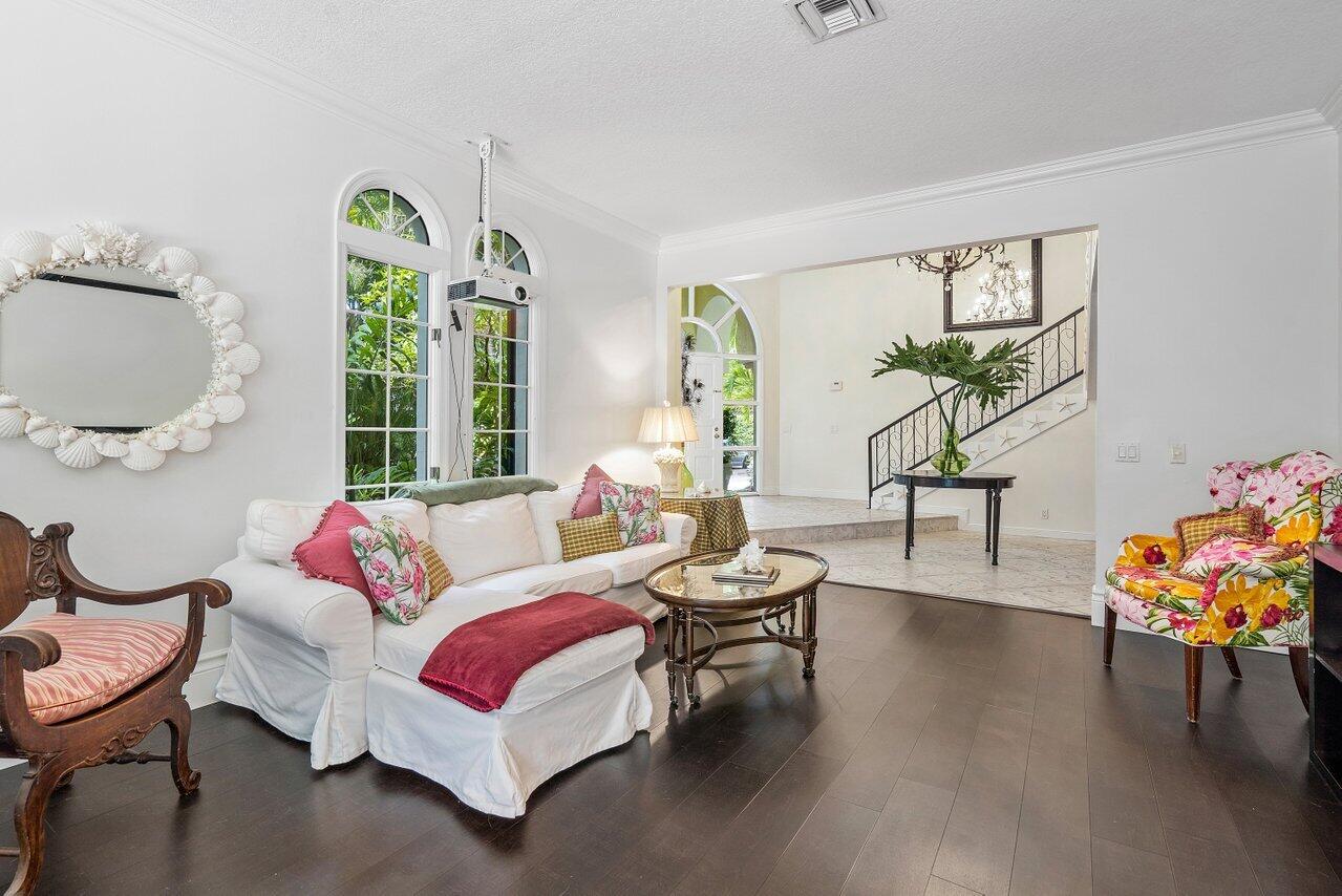 243 Florenada Terrace Boca Raton, FL 33486 - Photo 9 of 48 a living room with furniture and a flat screen tv