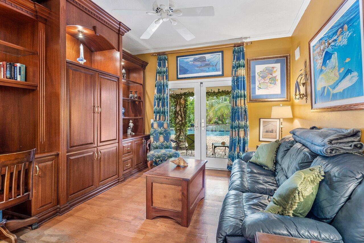 243 Florenada Terrace Boca Raton, FL 33486 - Photo 10 of 48 a living room with furniture ceiling fan and a window