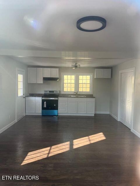 1486 Short Street Morristown, TN 37814 - Photo 8 of 12 a kitchen with a sink and a stove top oven