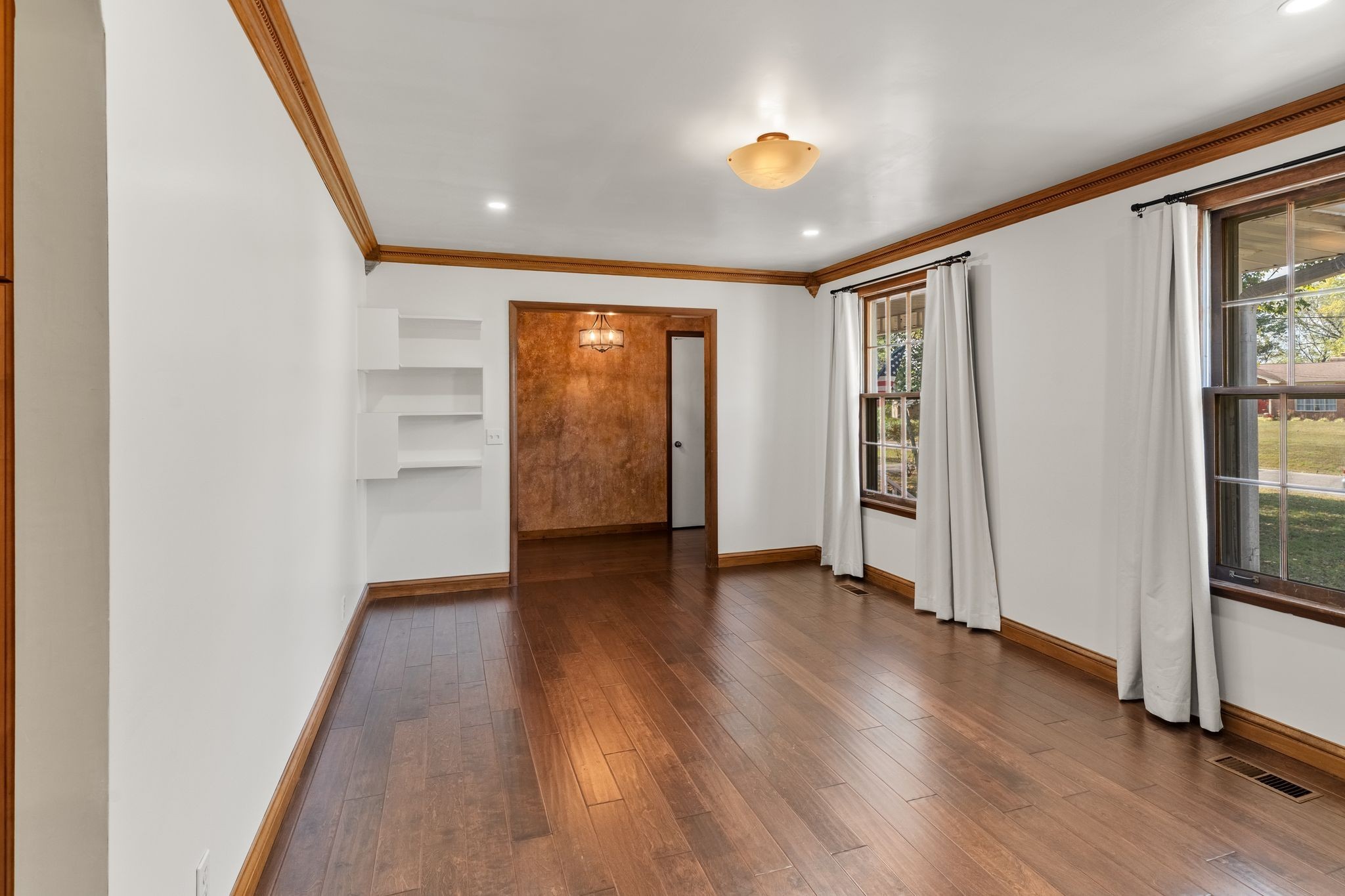 104 Meadowvue Drive Hendersonville, TN 37075 - Photo 12 of 43 wooden floor in an empty room with a window