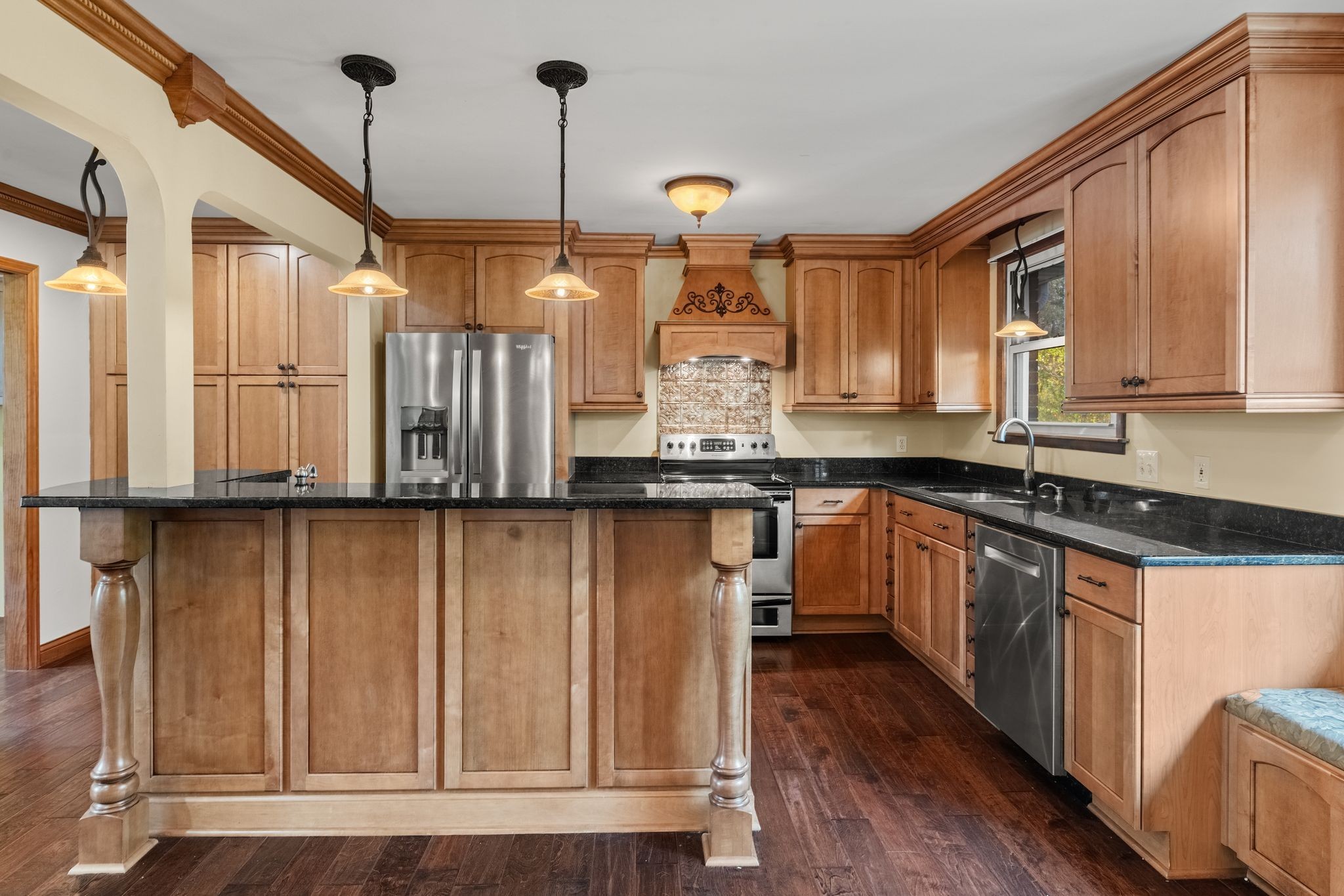 104 Meadowvue Drive Hendersonville, TN 37075 - Photo 15 of 43 a kitchen with stainless steel appliances granite countertop a stove a sink and a refrigerator