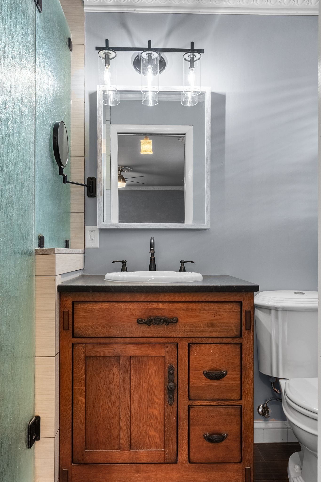 104 Meadowvue Drive Hendersonville, TN 37075 - Photo 27 of 43 a bathroom with a toilet a sink and mirror