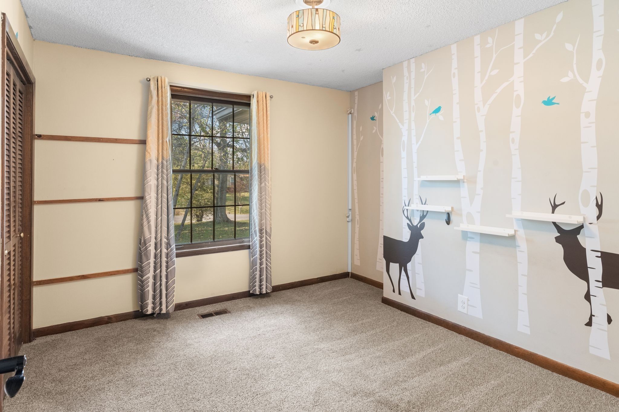 104 Meadowvue Drive Hendersonville, TN 37075 - Photo 29 of 43 a view of livingroom with furniture and window