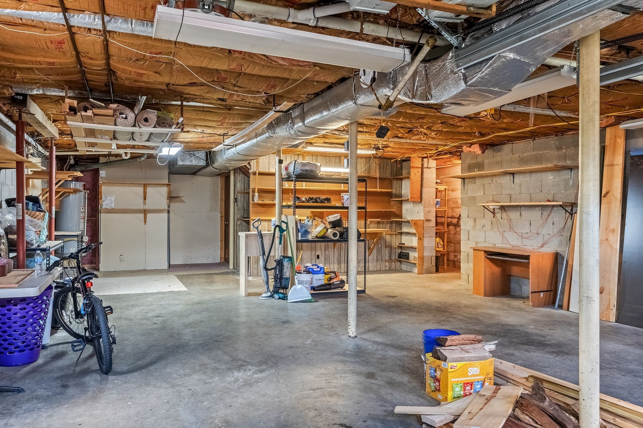 104 Meadowvue Drive Hendersonville, TN 37075 - Photo 35 of 43 a view of a garage with a white car parked