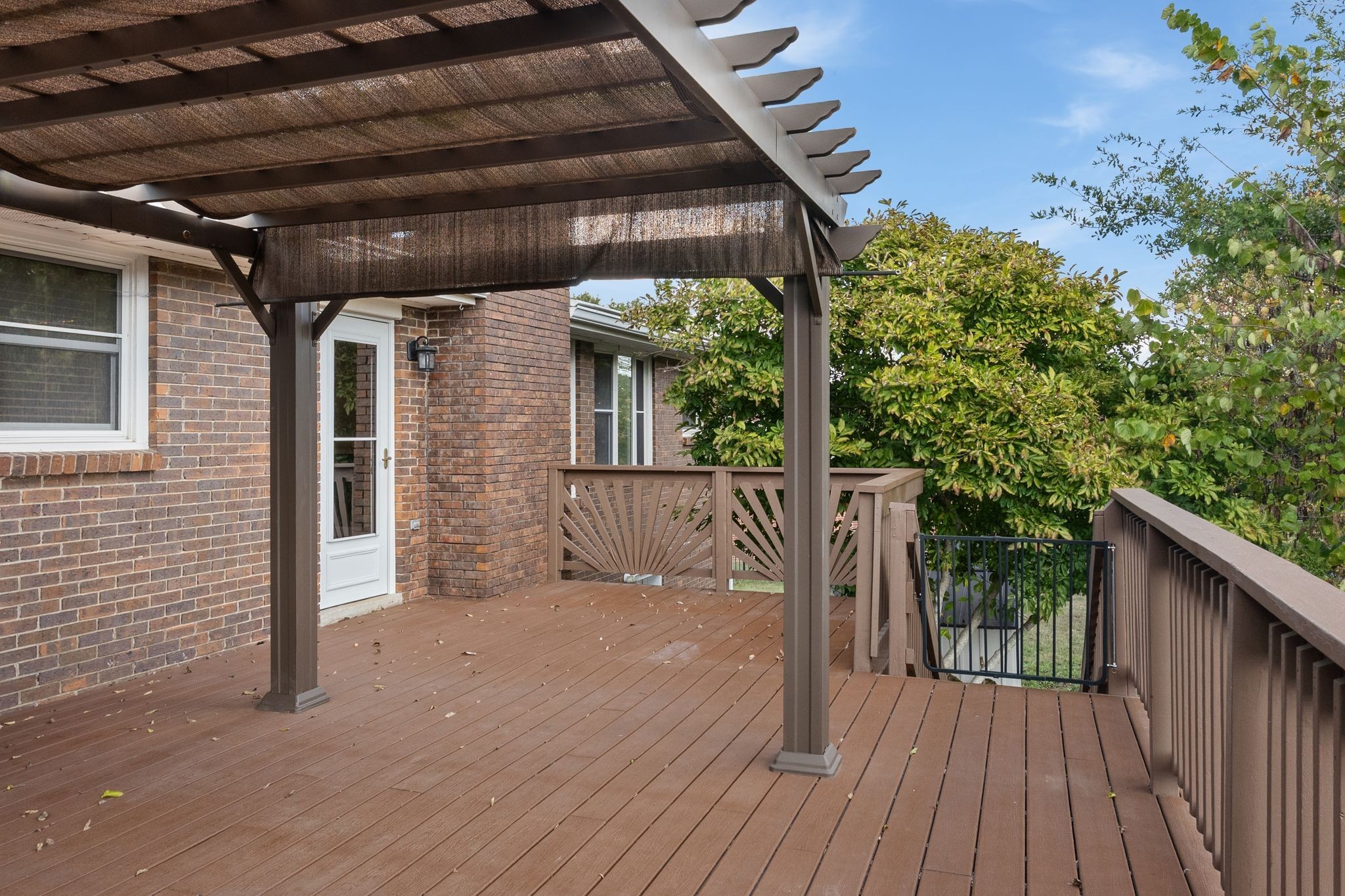 104 Meadowvue Drive Hendersonville, TN 37075 - Photo 39 of 43 a view of backyard with a deck and wooden floor