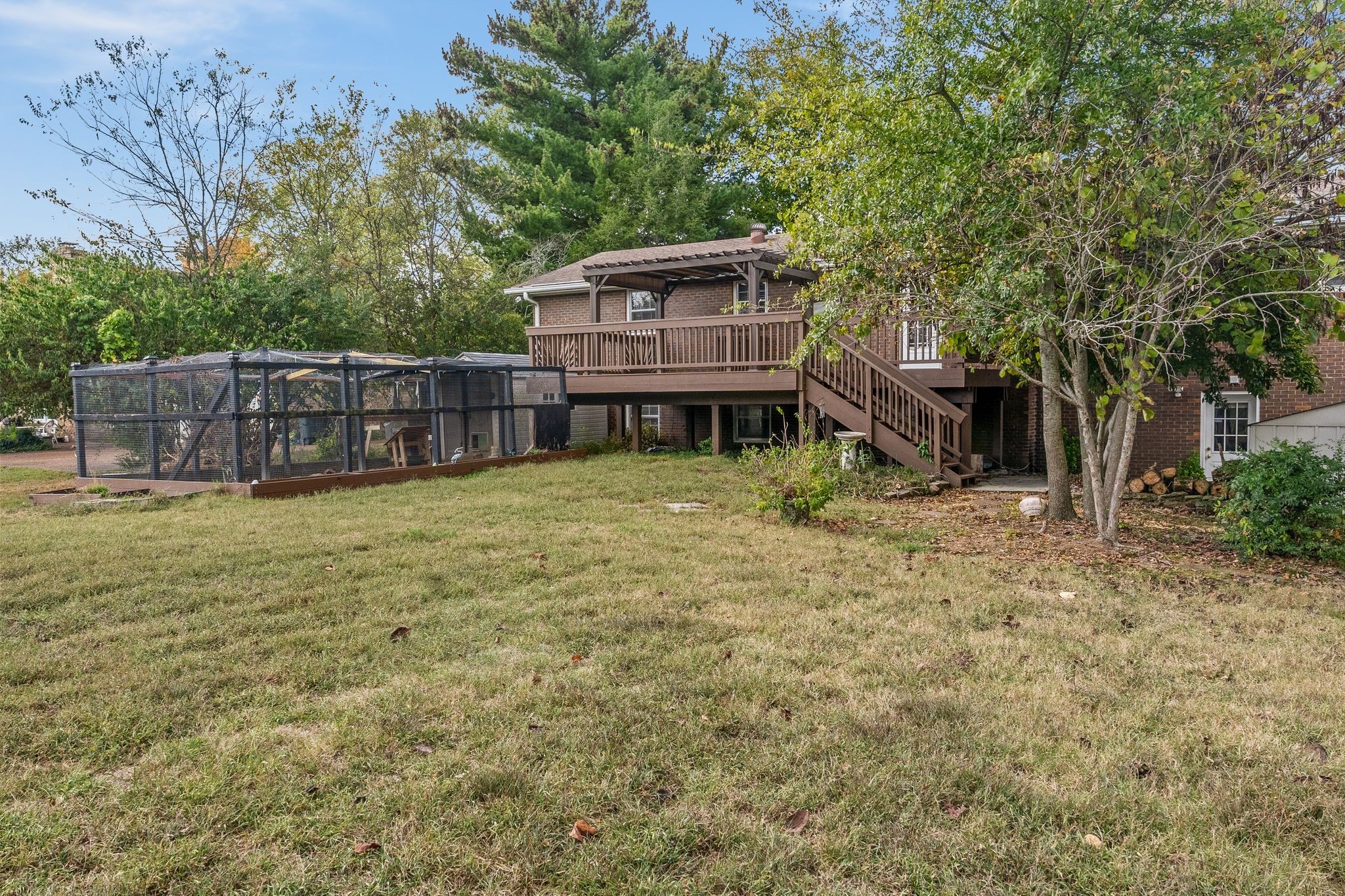104 Meadowvue Drive Hendersonville, TN 37075 - Photo 41 of 43 a view of a house with a yard and sitting area