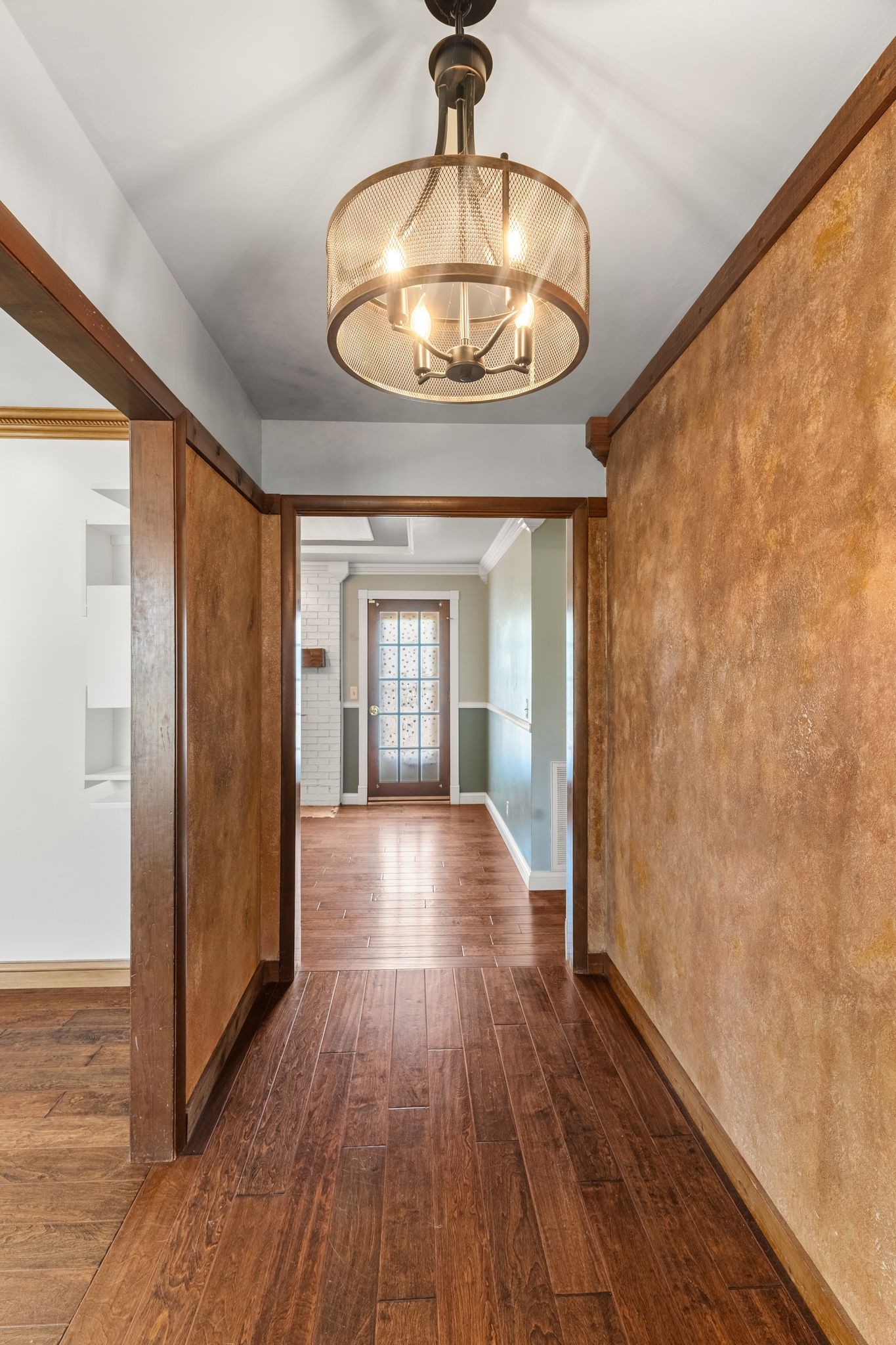 104 Meadowvue Drive Hendersonville, TN 37075 - Photo 7 of 43 a view of an empty room with wooden floor and a window