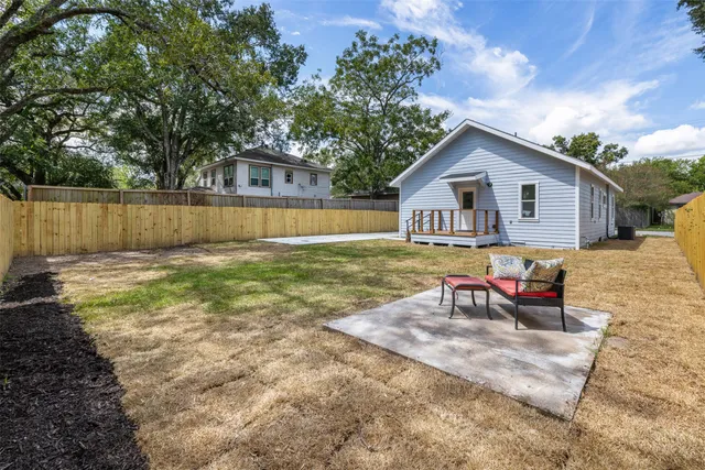a view of a backyard with a patio