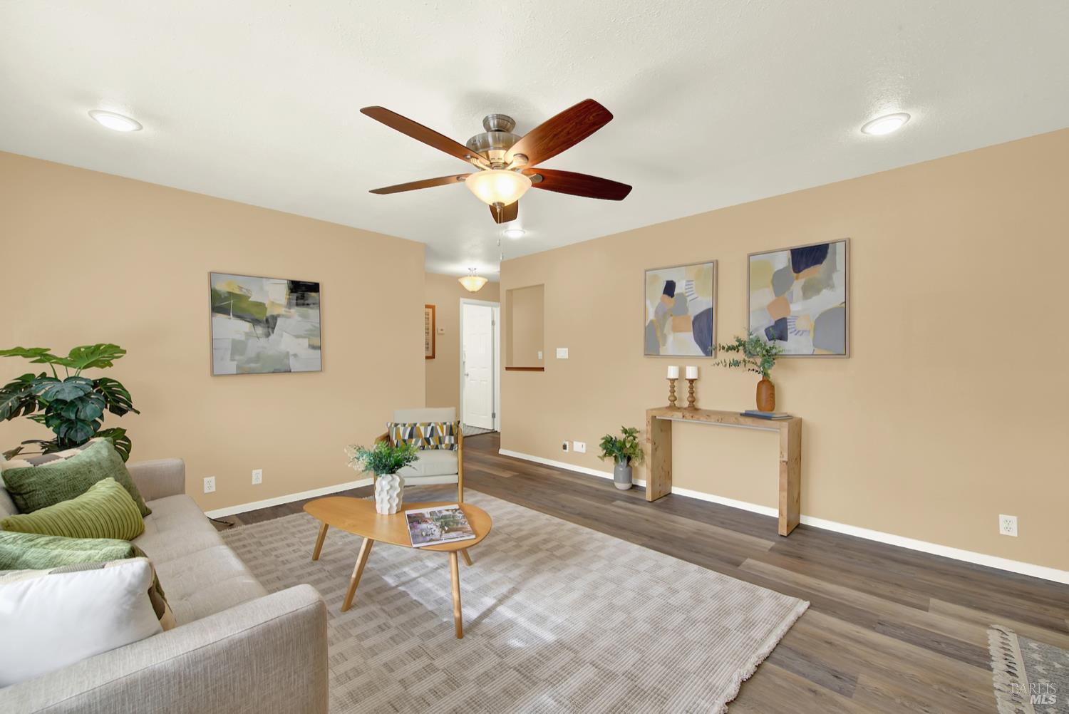 112 East Kentucky Street Fairfield, CA 94533 - Photo 18 of 70 a living room with furniture and a wooden floor