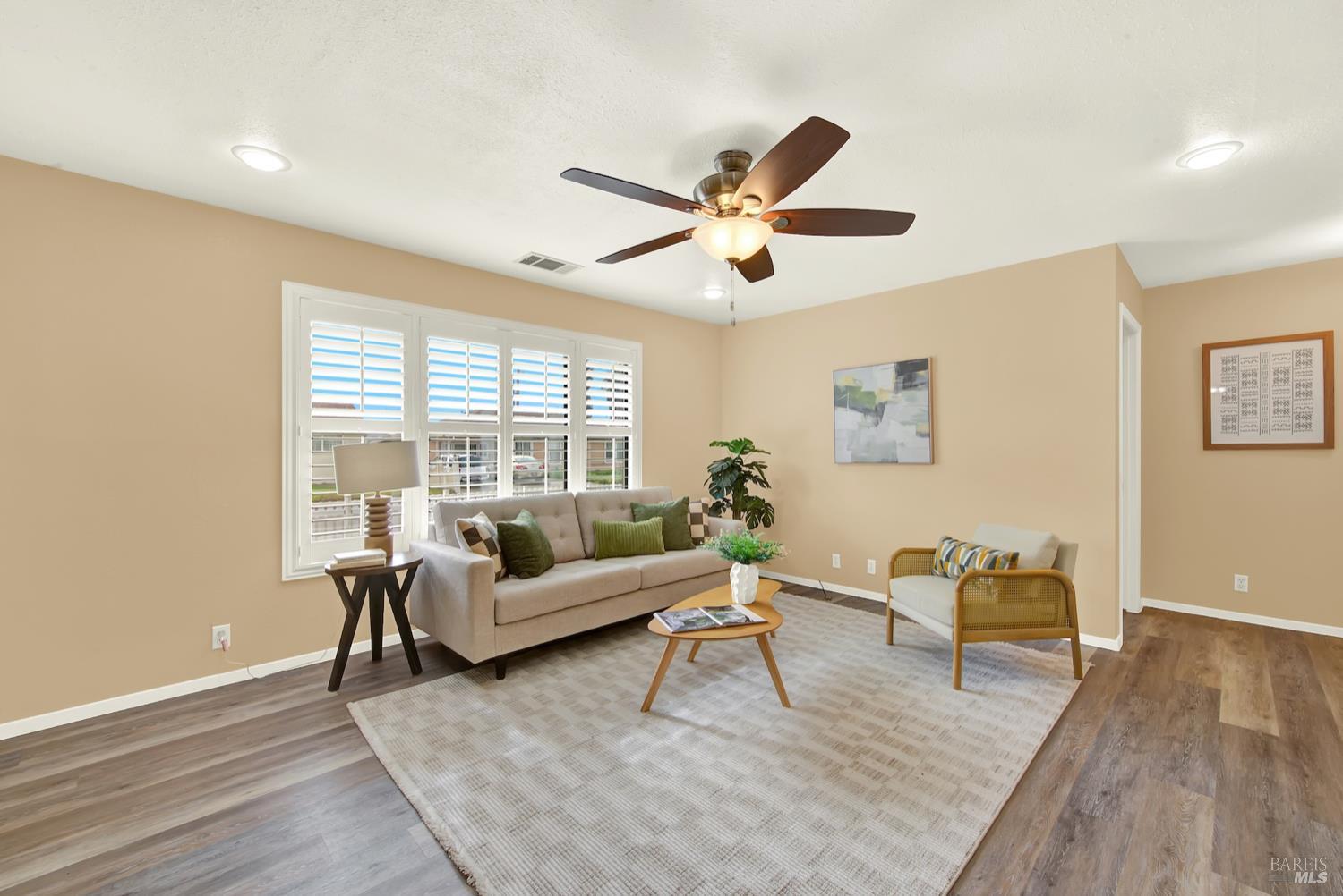 112 East Kentucky Street Fairfield, CA 94533 - Photo 19 of 70 a living room with furniture and a large window