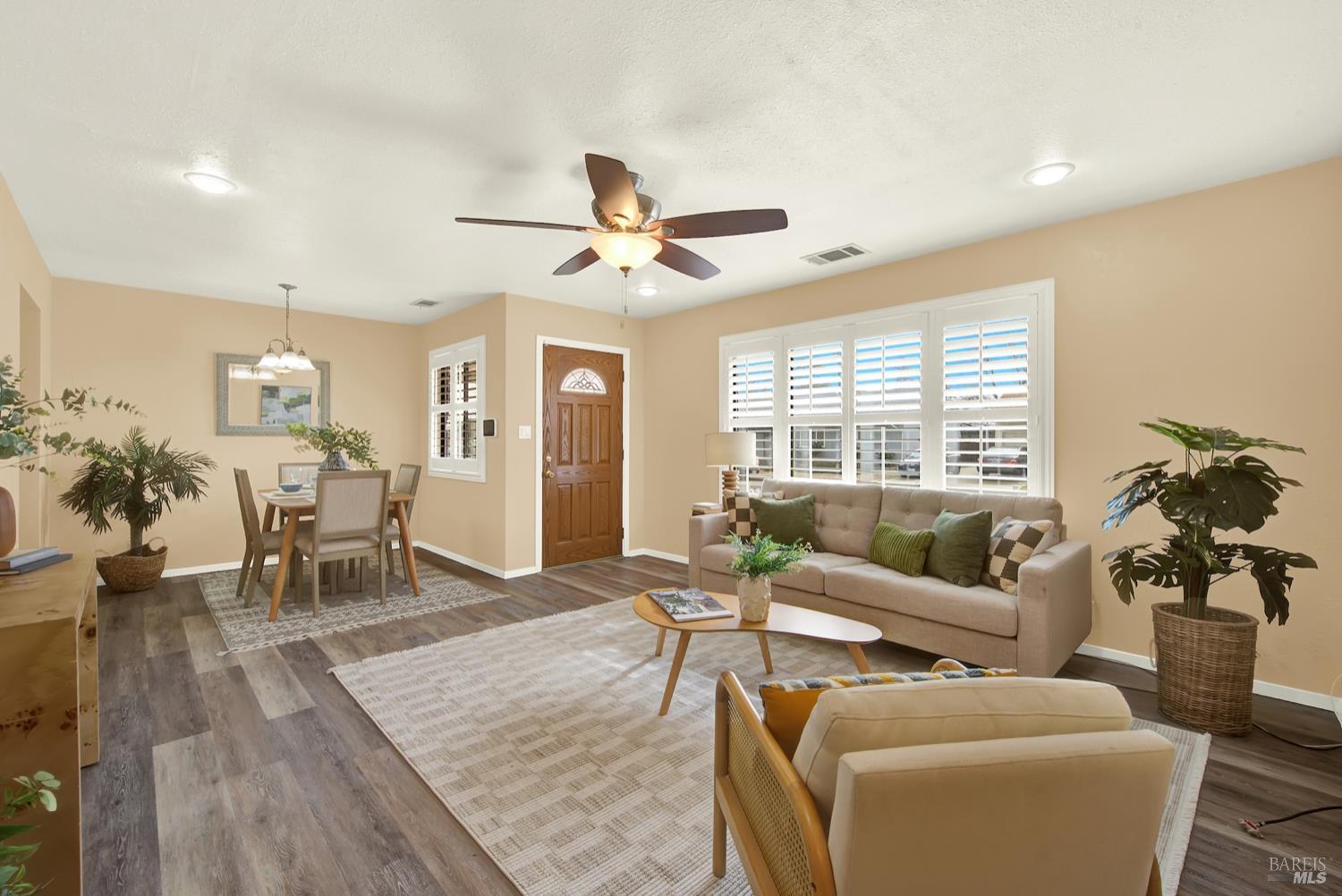 112 East Kentucky Street Fairfield, CA 94533 - Photo 20 of 70 a living room with furniture and a large window