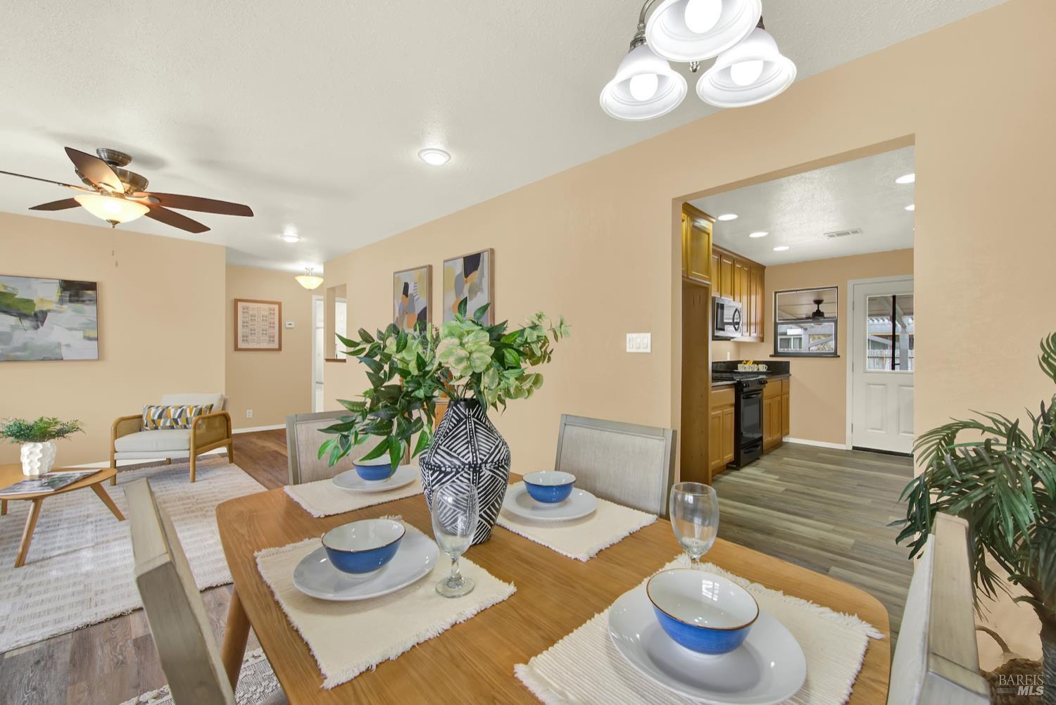 112 East Kentucky Street Fairfield, CA 94533 - Photo 23 of 70 a living room with furniture and a table