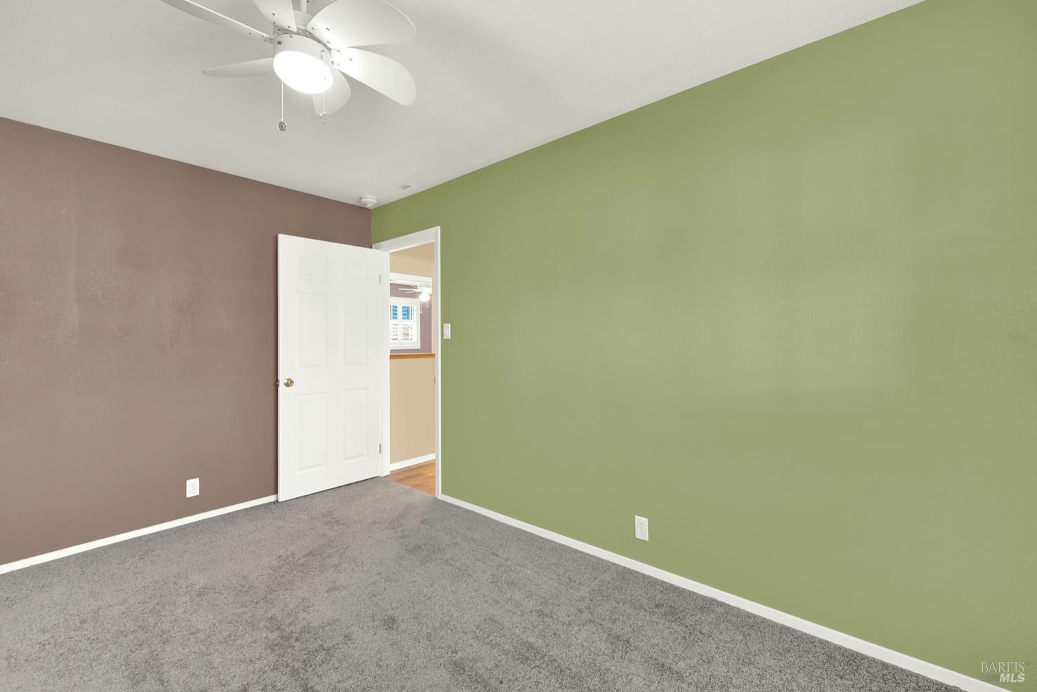 112 East Kentucky Street Fairfield, CA 94533 - Photo 38 of 70 a view of an empty room with a fan