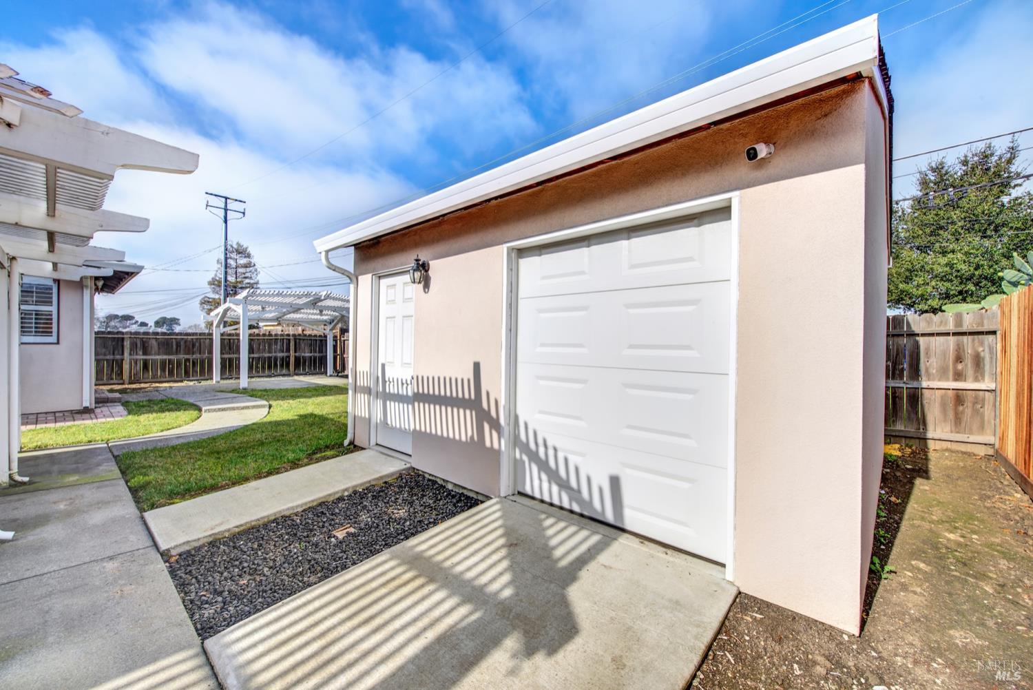 112 East Kentucky Street Fairfield, CA 94533 - Photo 56 of 70 a front view of a house with a yard