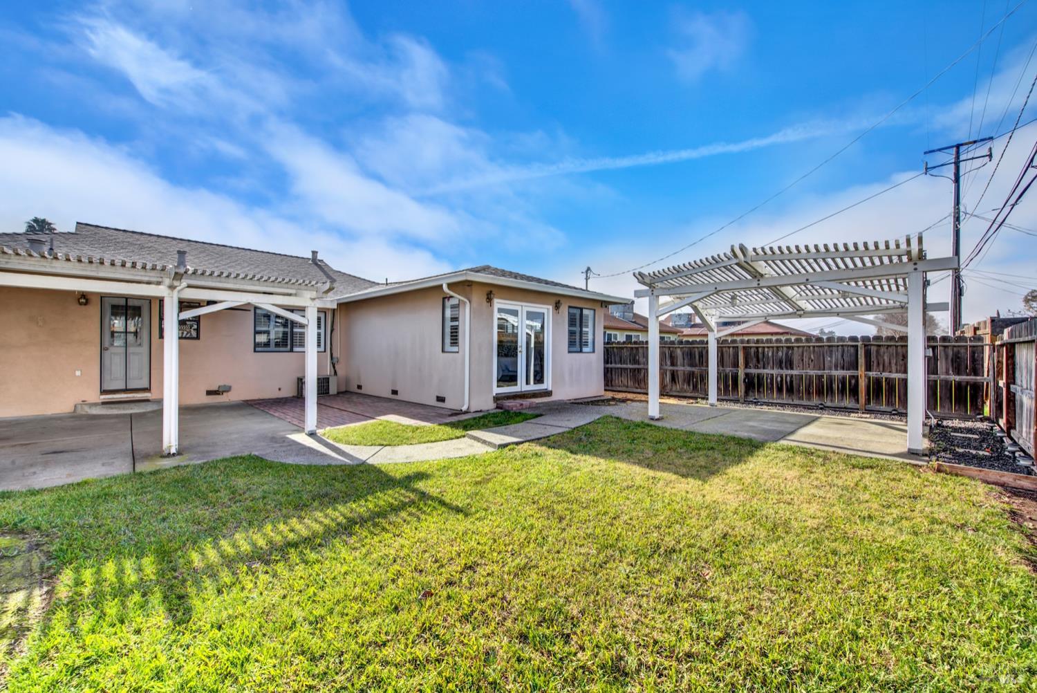 112 East Kentucky Street Fairfield, CA 94533 - Photo 62 of 70 a view of a house with a yard and sitting area