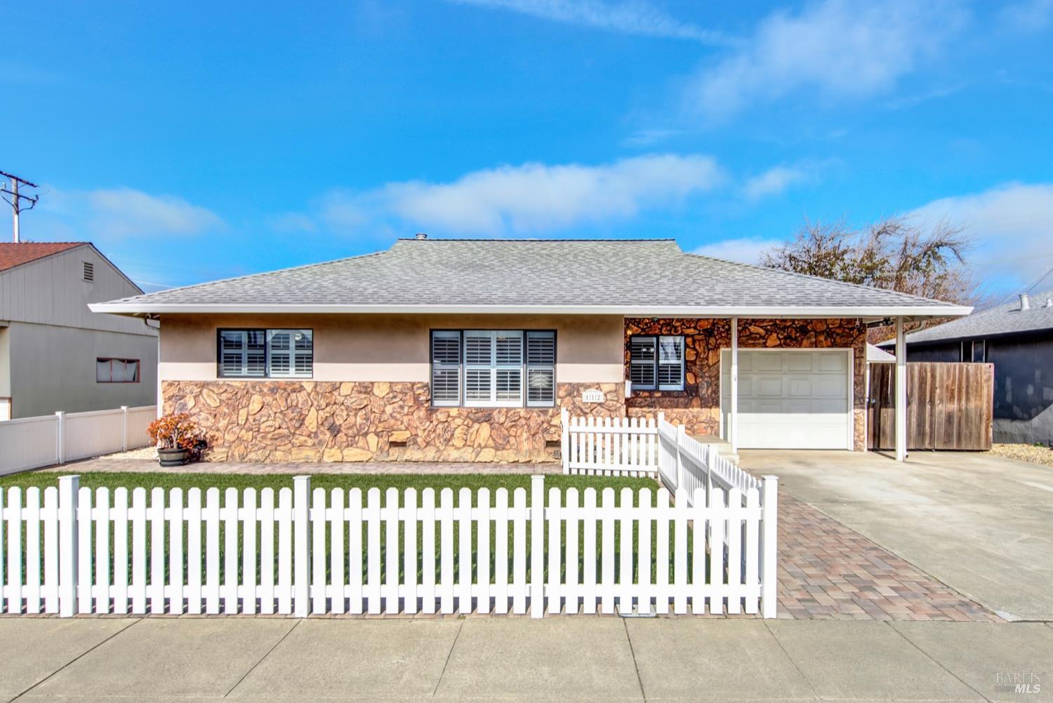 112 East Kentucky Street Fairfield, CA 94533 - Photo 7 of 70 a front view of a house with a garden