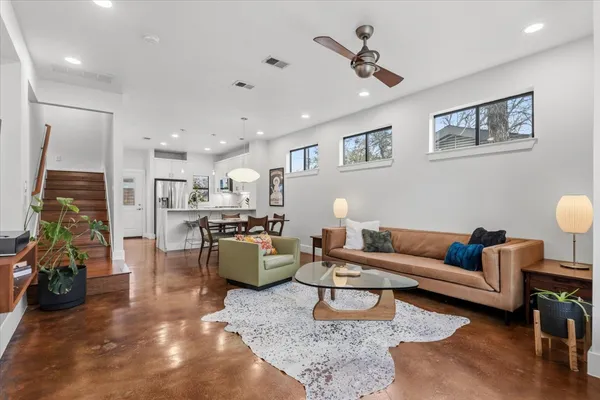 a living room with furniture and a couch
