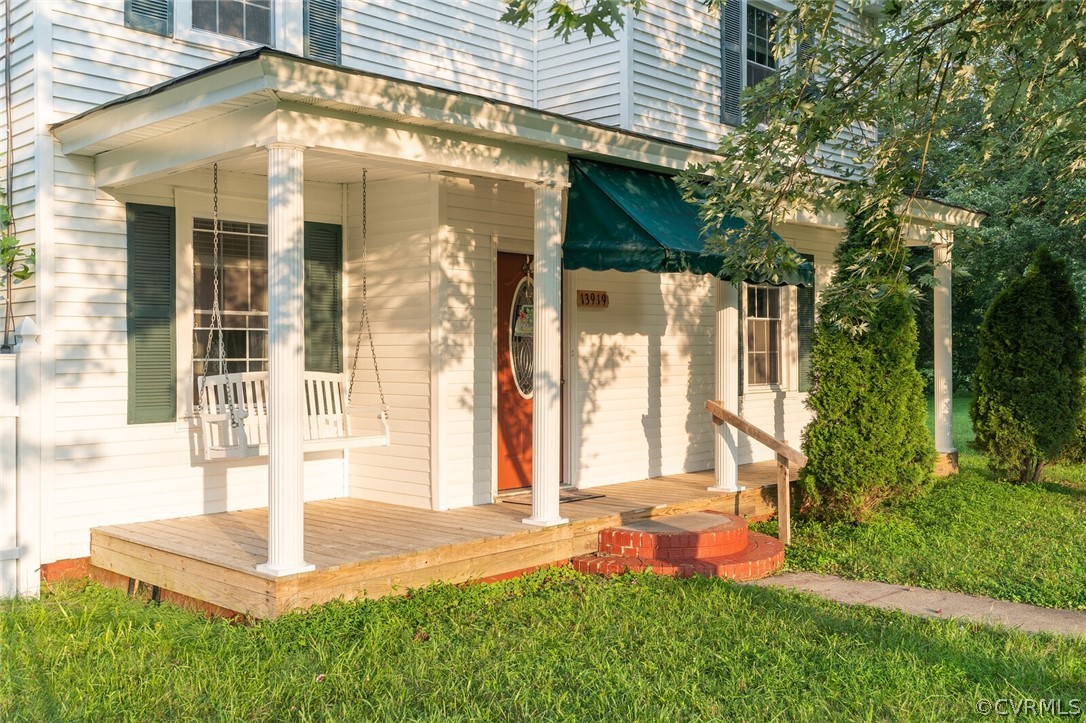 Country front porch with swing