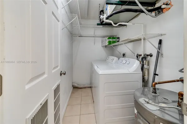 a utility room with cabinets