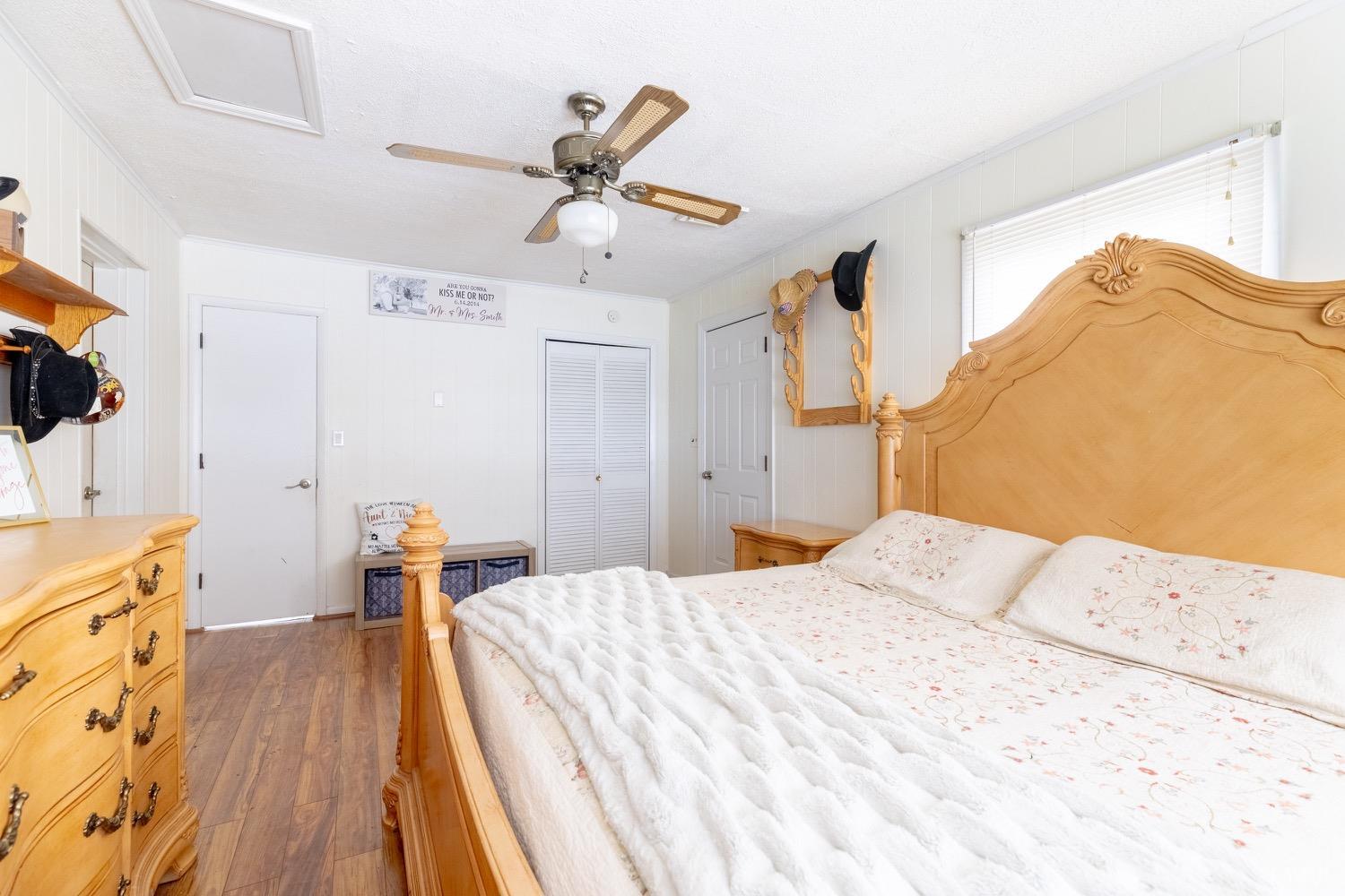4100 Roark Mill Road Hurt, VA 24563 - Photo 11 of 42 a bedroom with a bed and wooden floor
