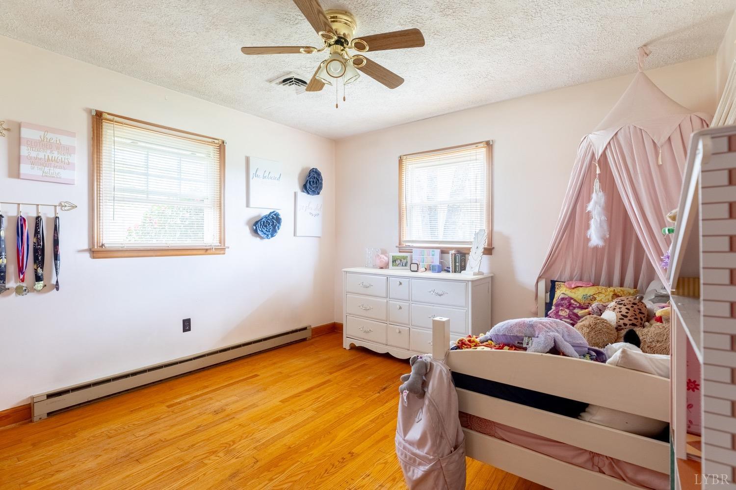 4100 Roark Mill Road Hurt, VA 24563 - Photo 14 of 42 a room with furniture and a window