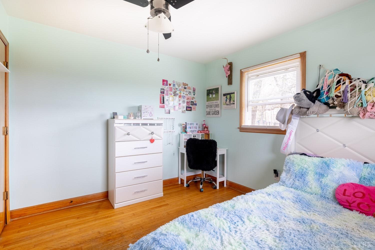 4100 Roark Mill Road Hurt, VA 24563 - Photo 18 of 42 a bedroom with a bed and a window