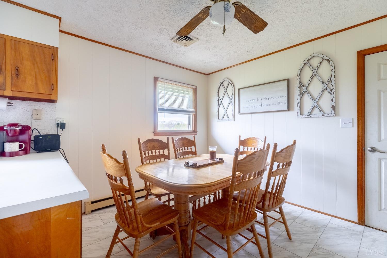 4100 Roark Mill Road Hurt, VA 24563 - Photo 6 of 42 a view of a dining room with furniture and window