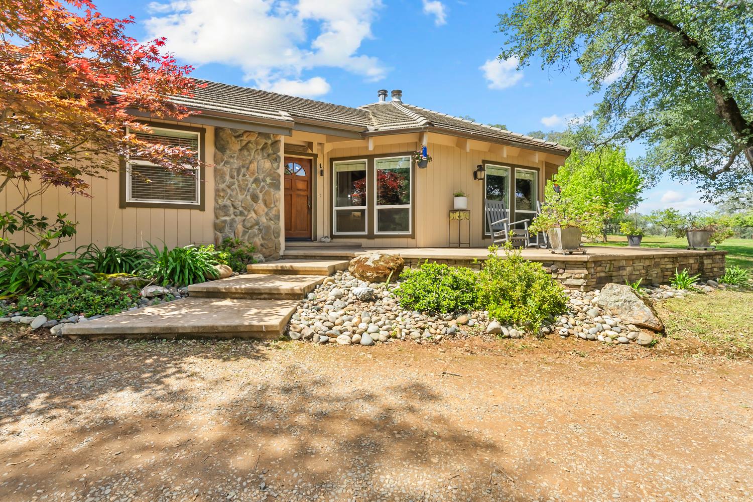5990 Upper Ridge Way Auburn, CA 95602 - Photo 2 of 51 front view of a house with a yard