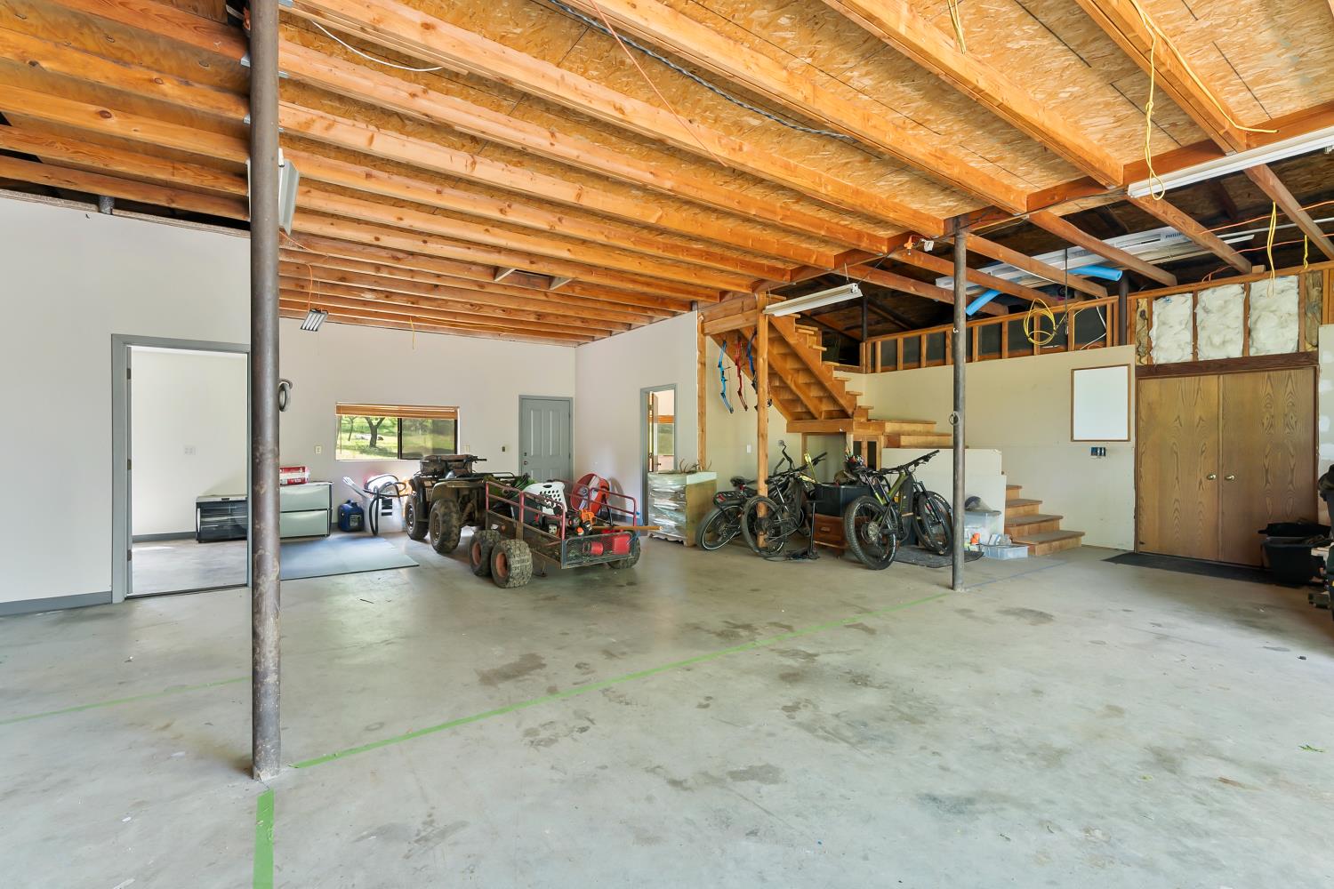 5990 Upper Ridge Way Auburn, CA 95602 - Photo 44 of 51 a view of a garage with a table and chairs