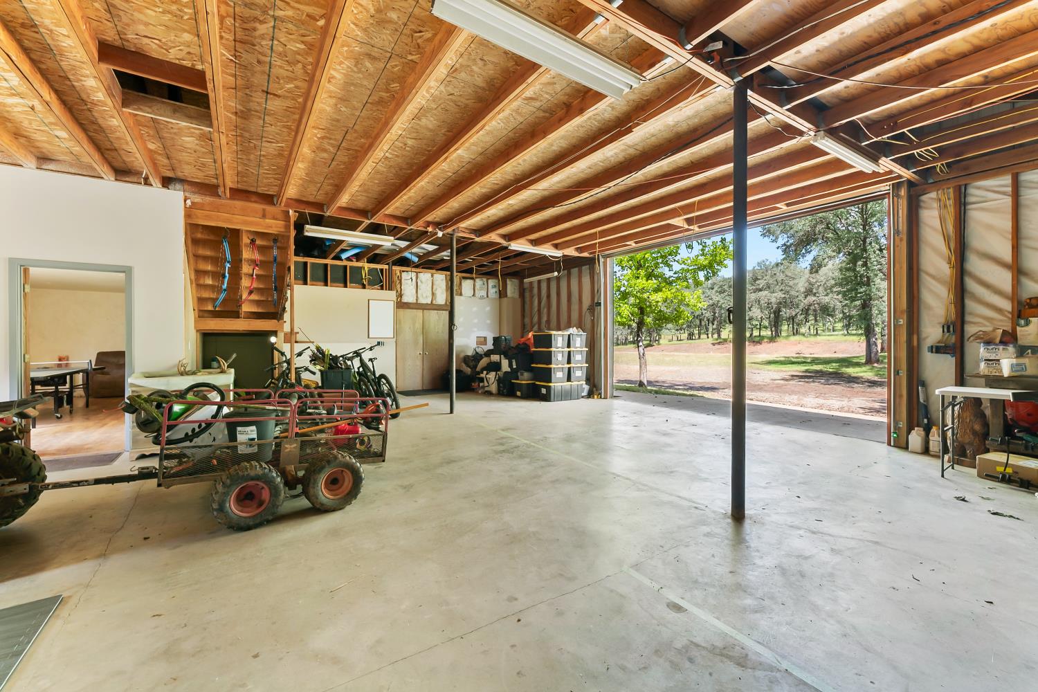 5990 Upper Ridge Way Auburn, CA 95602 - Photo 45 of 51 a view of a garage with a table and chairs