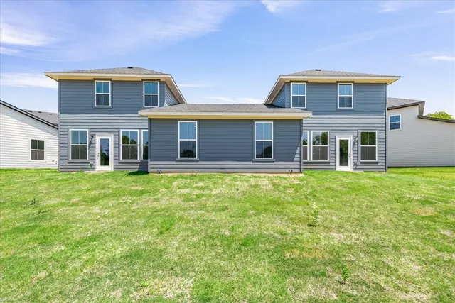 a front view of house with yard