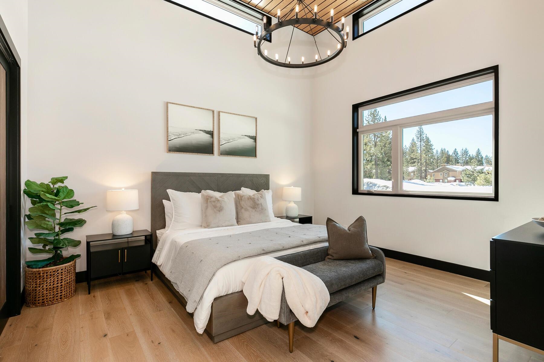 11687 Henness Road Truckee, CA 96161 - Photo 17 of 21 a bed room with a bed and a couch