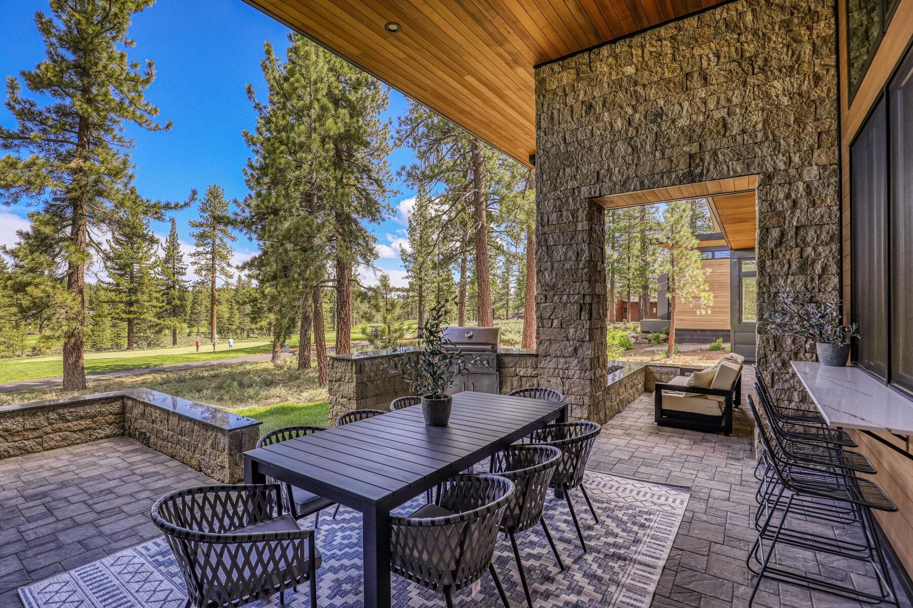 11687 Henness Road Truckee, CA 96161 - Photo 19 of 21 a backyard of a house with outdoor seating