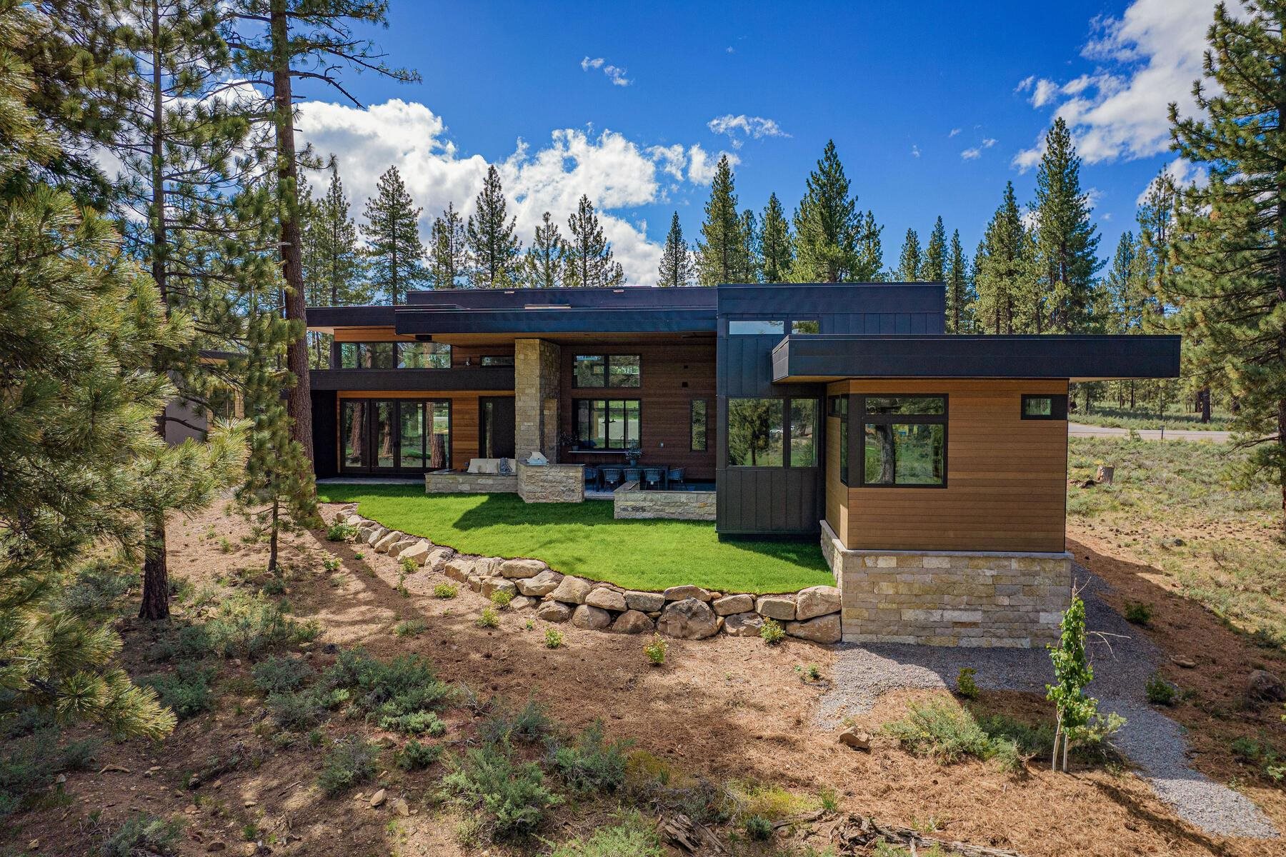 11687 Henness Road Truckee, CA 96161 - Photo 20 of 21 a front view of a house with a yard and fountain