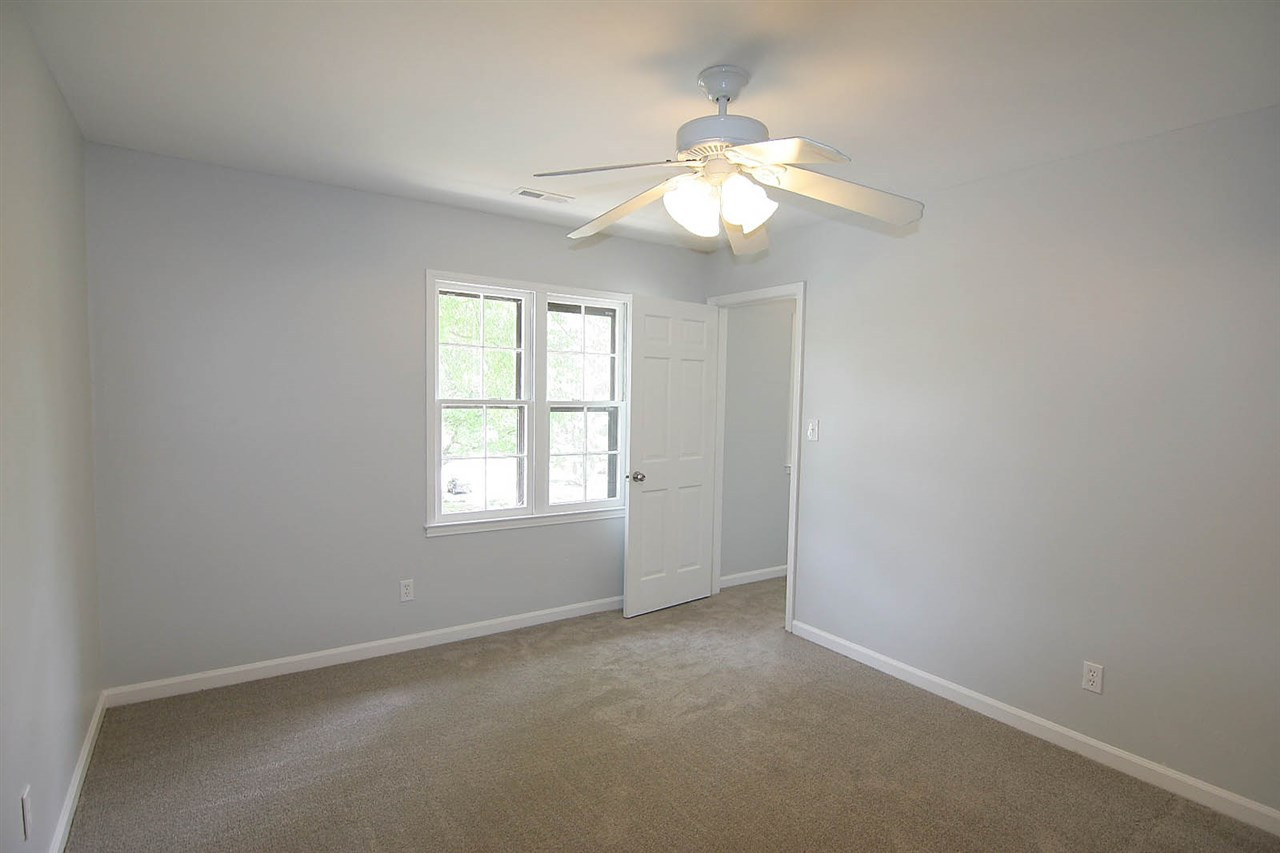 7801 Audubon Drive Raleigh, NC 27615 - Photo 19 of 25 Very Private Secondary Bedroom with Double Closet and Ceiling Fan Bedroom