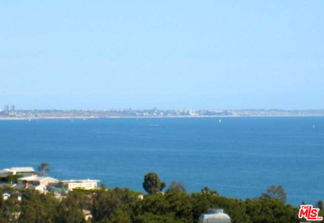 3444 Cloudcroft Drive Malibu, CA 90265 - Photo 16 of 50 a view of a lake and mountain in the back