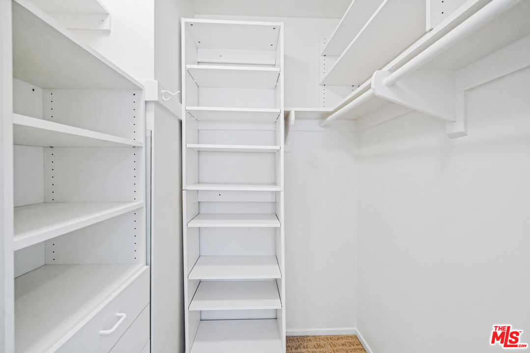 3444 Cloudcroft Drive Malibu, CA 90265 - Photo 28 of 50 a view of walk in closet with empty racks
